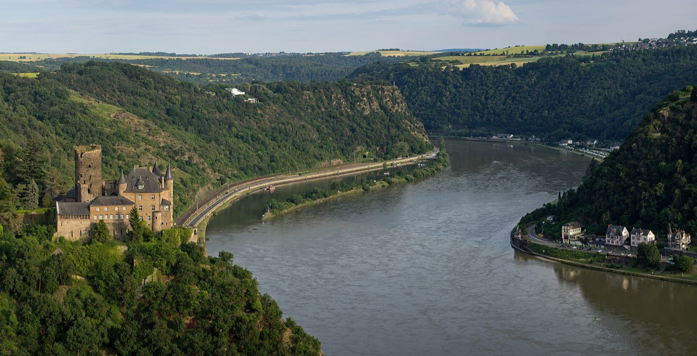 Burg Katz castle on a wooded hillside above a bend of the Rhine in the Rhine Gorge
